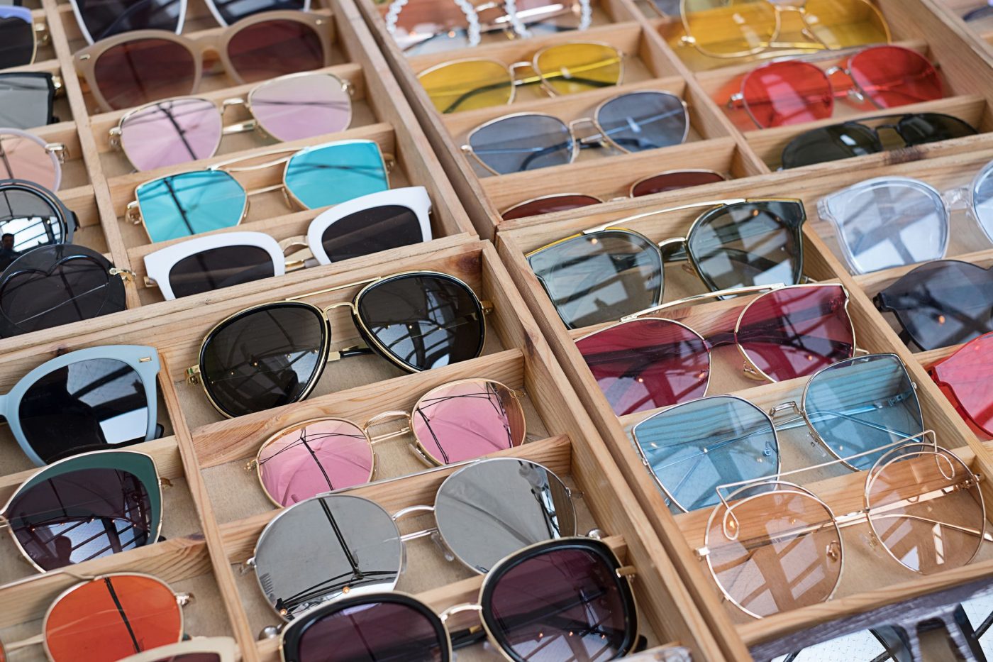 high-angle-view-of-colorful-sunglasses-for-sale-in-royalty-free-image-979123212-1558323960